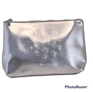 🍄 Nina Ricci Silver Cosmetic Bag